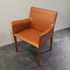 Modern Cheap Hot Selling Dining Room Furniture Modern Simple Orange 4 Legs Saddle Leather Dining Table Chairs Set